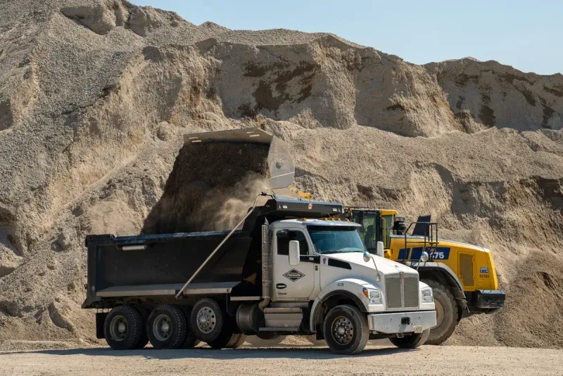 A Crush truck delivering material to a jobsite
